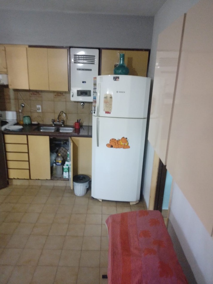 CASA AL FRENTE CON RETIRO DE JARDIN 