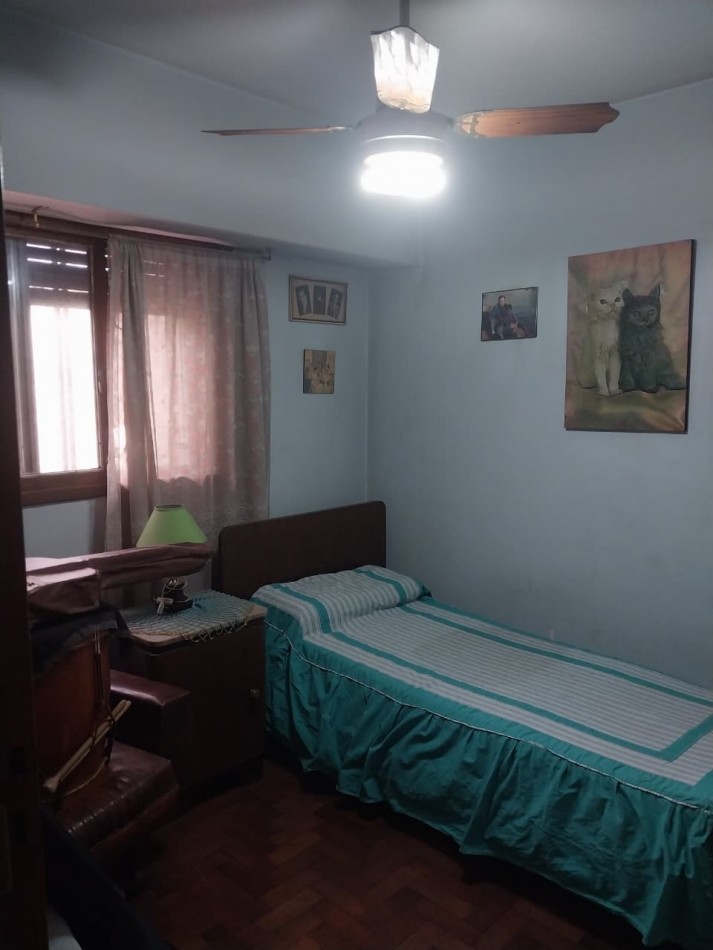 CASA AL FRENTE CON RETIRO DE JARDIN 