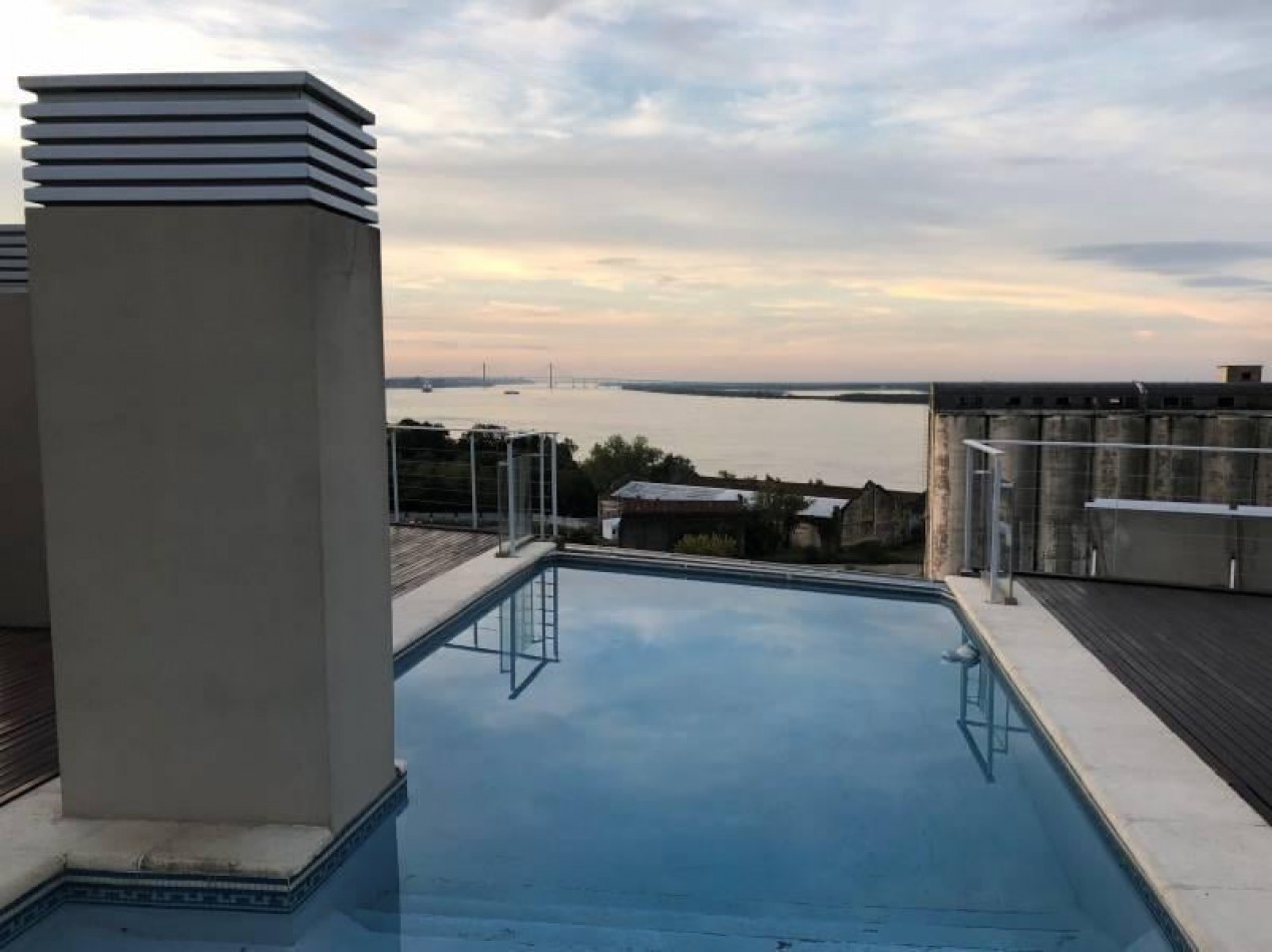 Departamento Semipiso exclusivo al frente en esquina vista total al rio 2 dormitorios con cochera Puerto Norte Posibilidad de ´Permuta en parte de pago