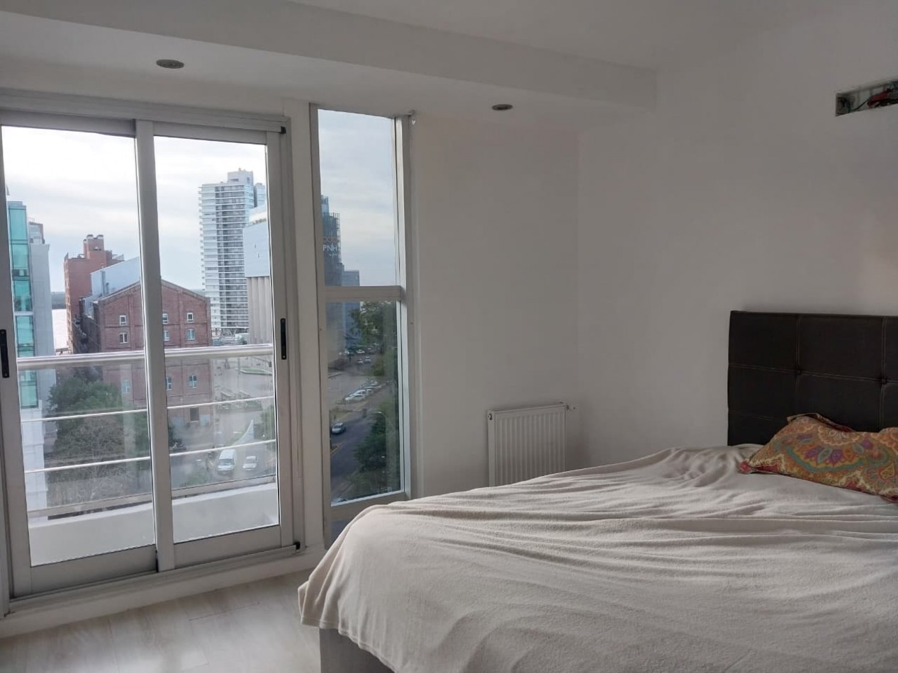 Departamento Semipiso exclusivo al frente en esquina vista total al rio 2 dormitorios con cochera Puerto Norte Posibilidad de ´Permuta en parte de pago
