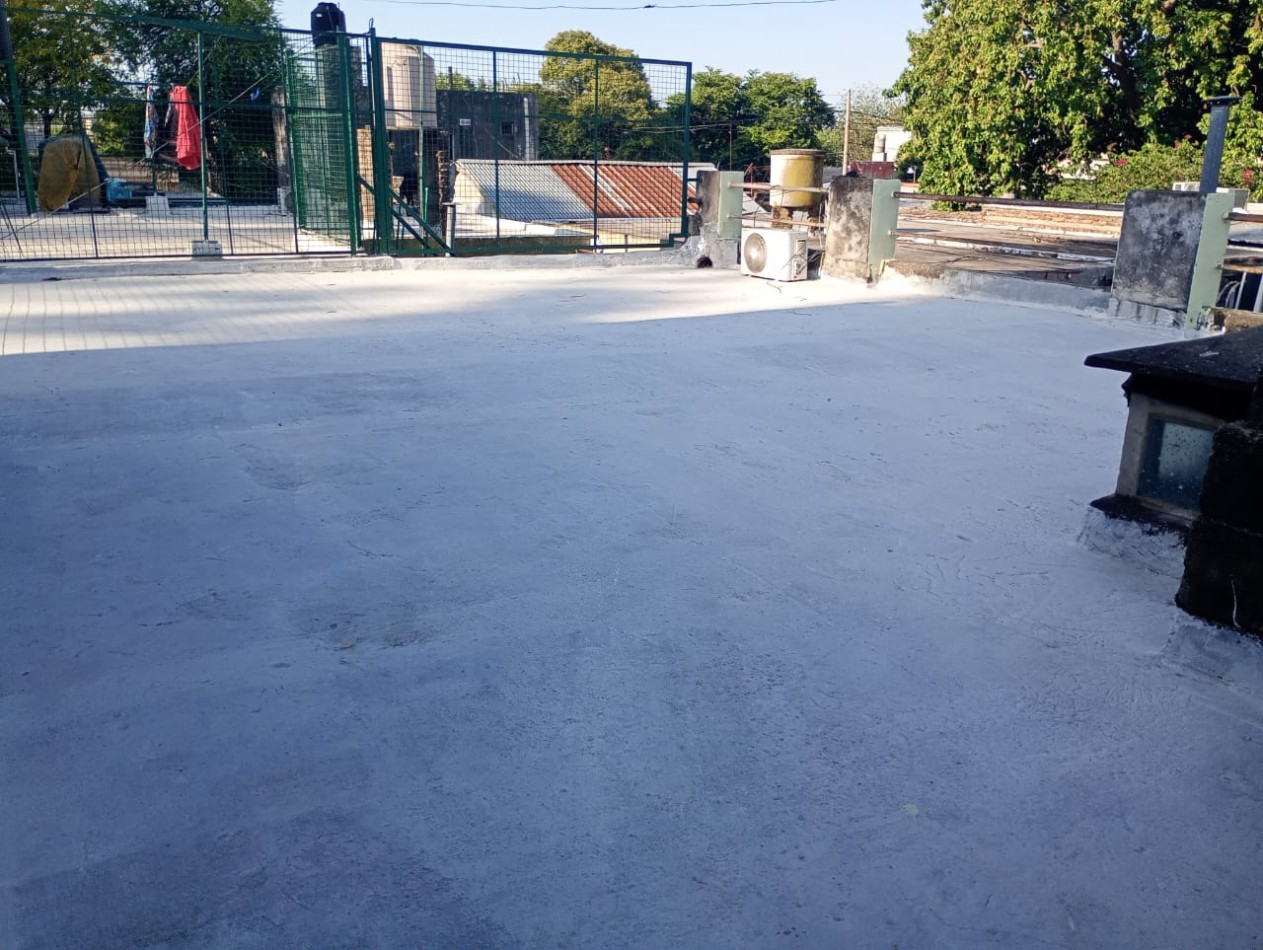 Departamento interno de Pasillo Unico de 2 Dormitorios con Patio Parrillero