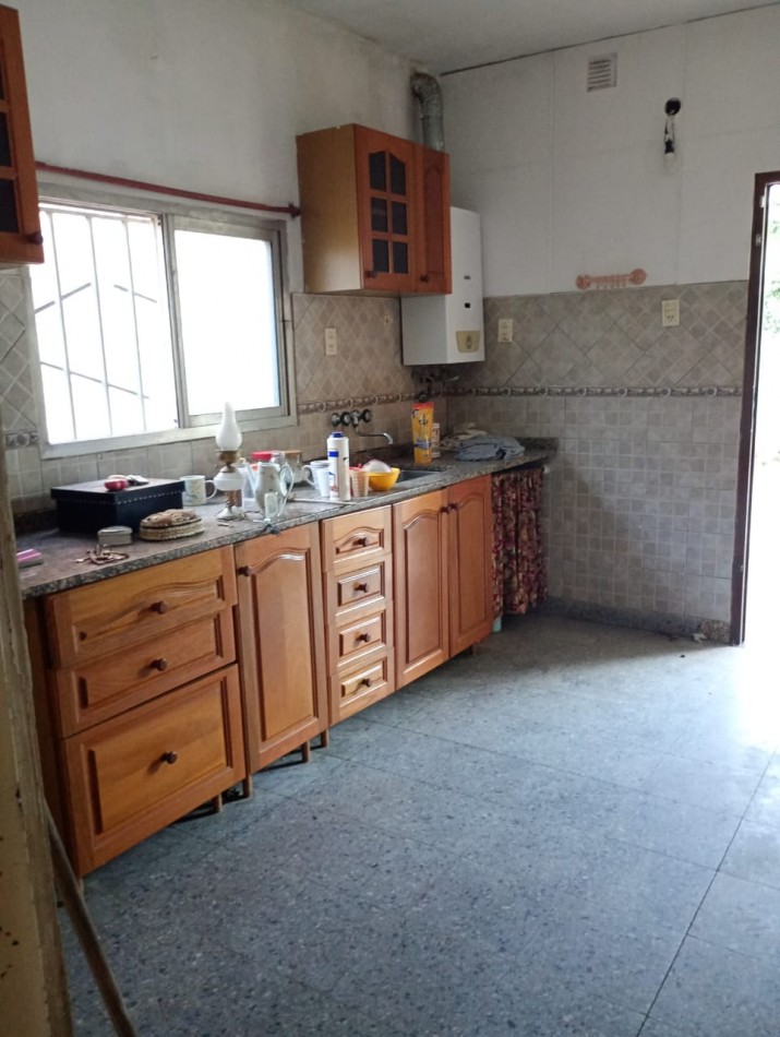 Departamento interno de Pasillo Unico de 2 Dormitorios con Patio Parrillero