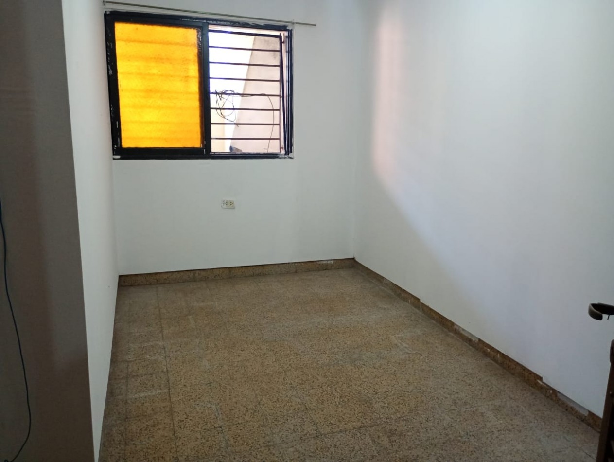 Departamento interno de Pasillo Unico de 2 Dormitorios con Patio Parrillero